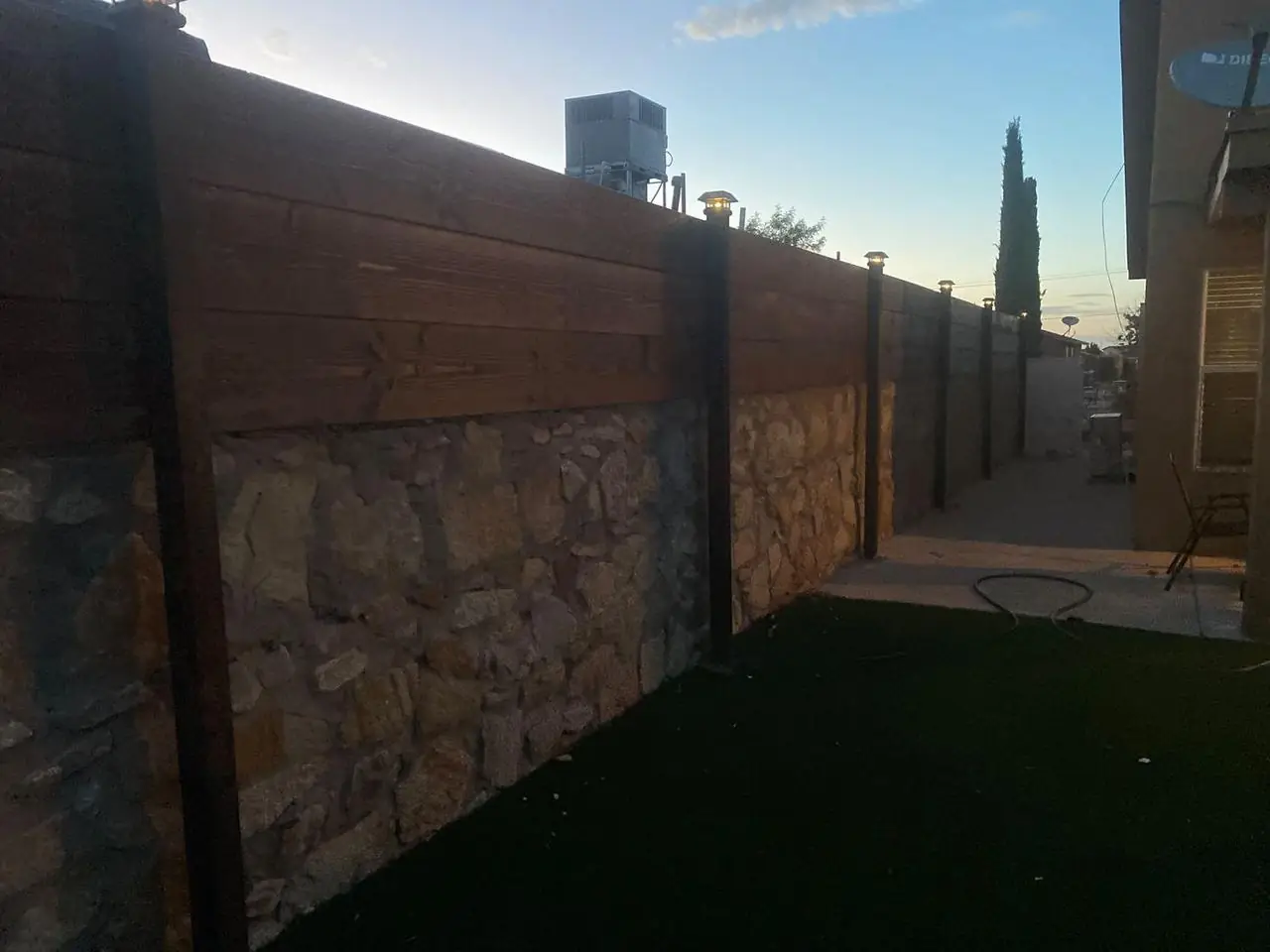 Rock and wood fence